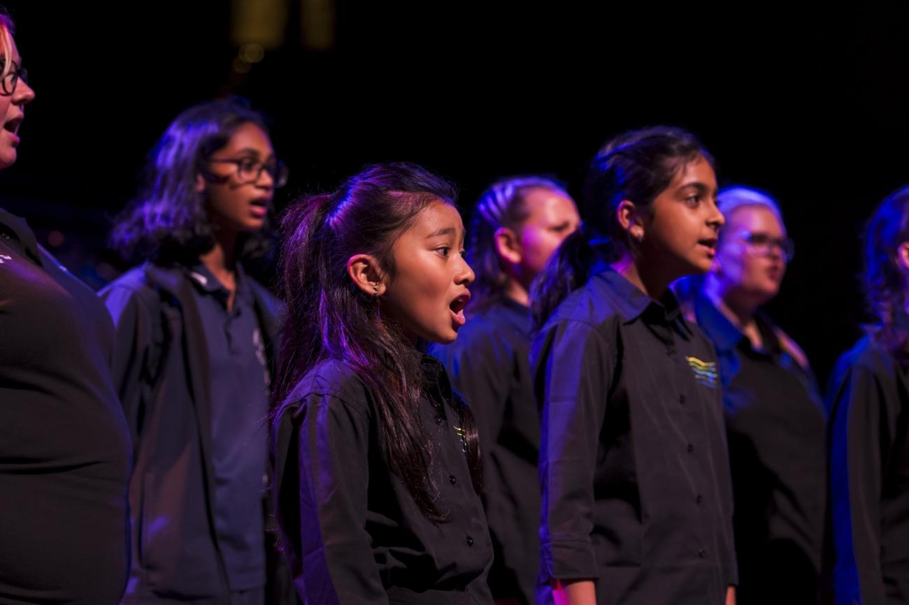 Students sing at the Sydney Opera house