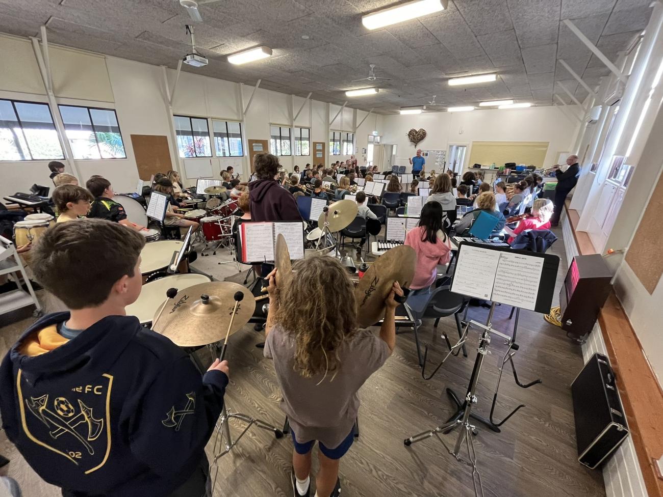 School students rehearsing in a concert band